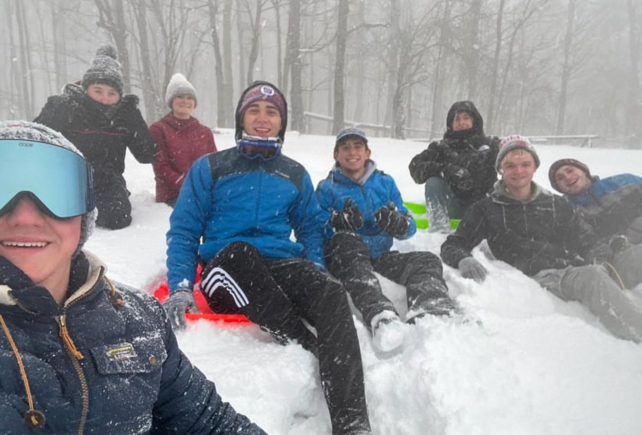 Group of people playing in snow